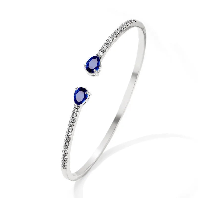 Multi-zircon personalised copper bracelet with inlaid crystal gemstones in white or blue colour