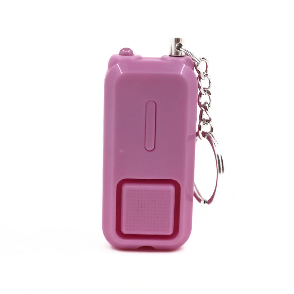 Compact personal safety alarm device in multiple colours showing 65x30x12mm dimensions