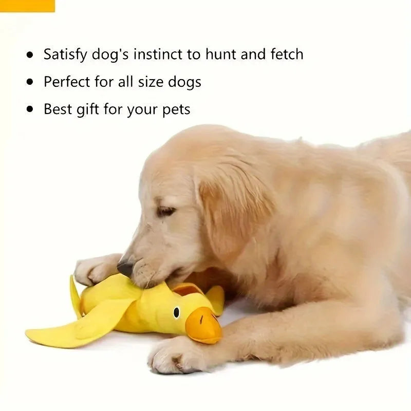 Yellow plush teddy dog toy with internal squeaky duck for training and food leak feature