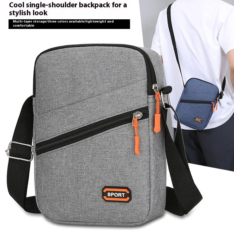 Oxford cloth crossbody commuter shoulder bag in silver grey colour with contrast details