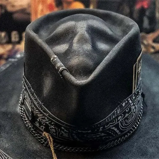 Handmade wool felt Halloween hat with conical crown and skull print, featuring denim fabric accents