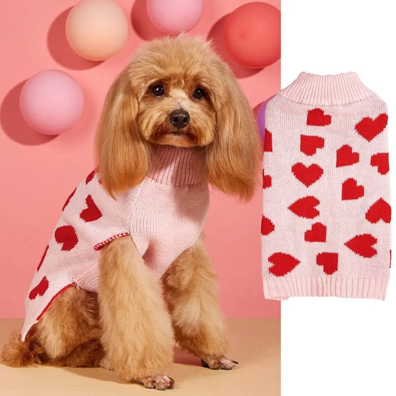 Red acrylic dog sweater with a large white love heart design on the back.