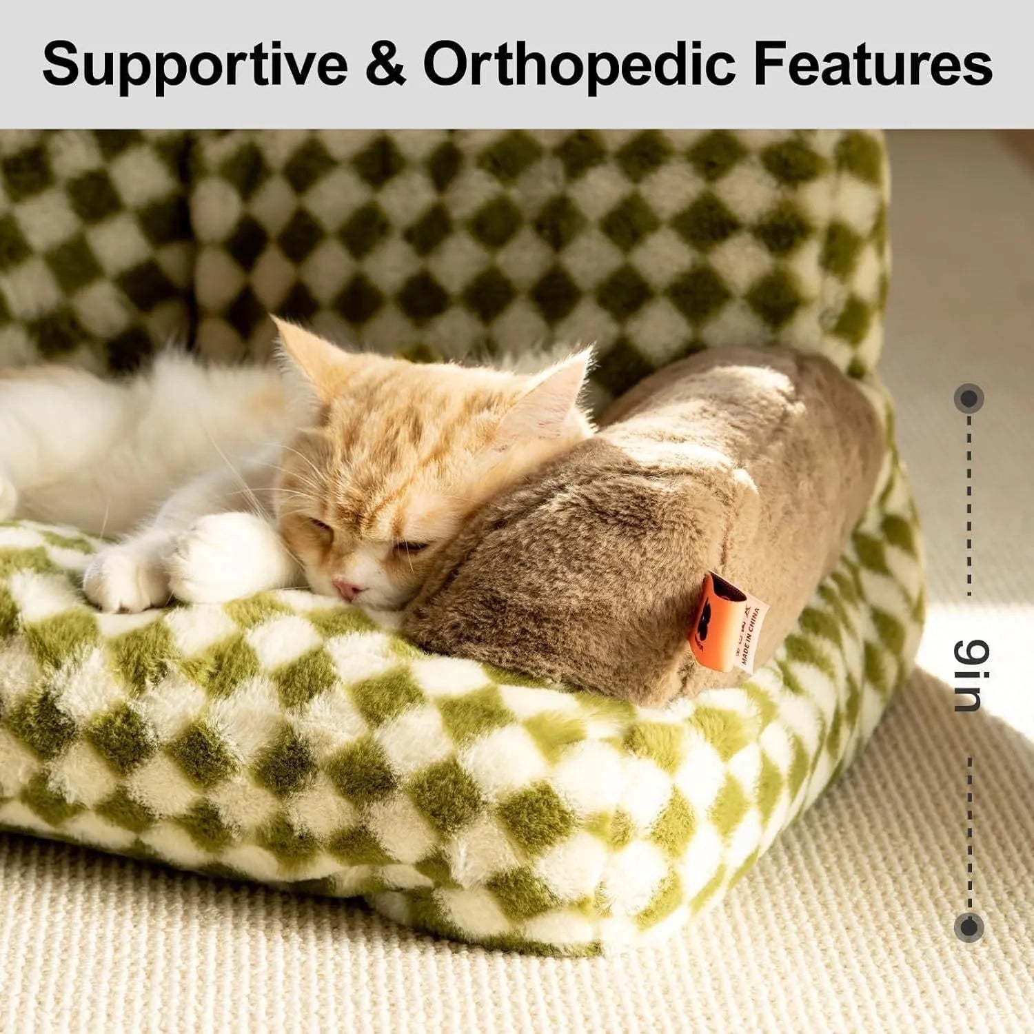Fluffy cat couch bed in black and white with raised sides and non-slip base for cats and small dogs