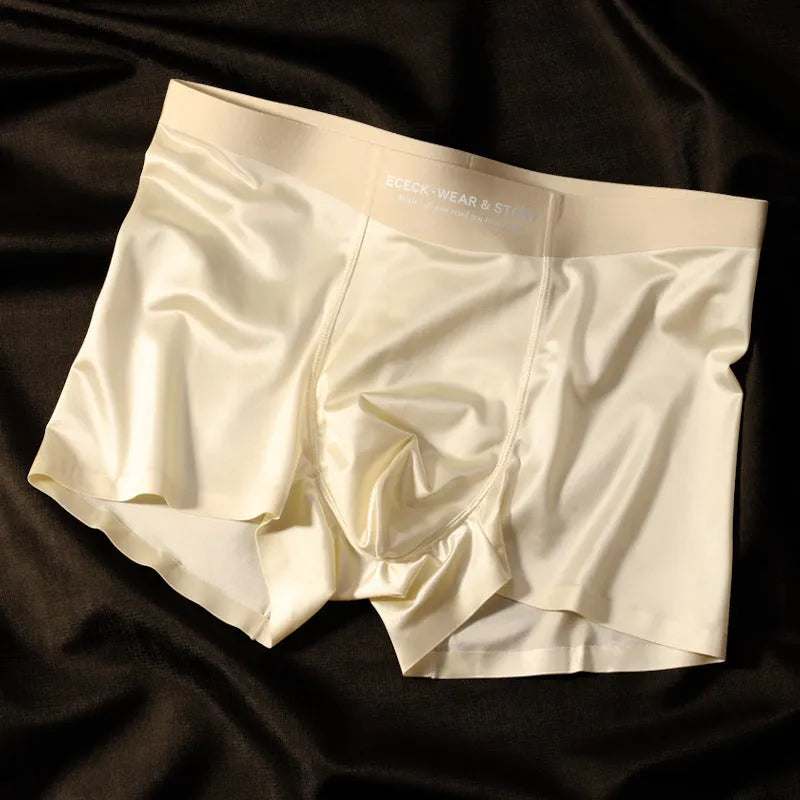 Men's colourblock Ice Silk seamless underwear in blue, brown, gray, and white colours.