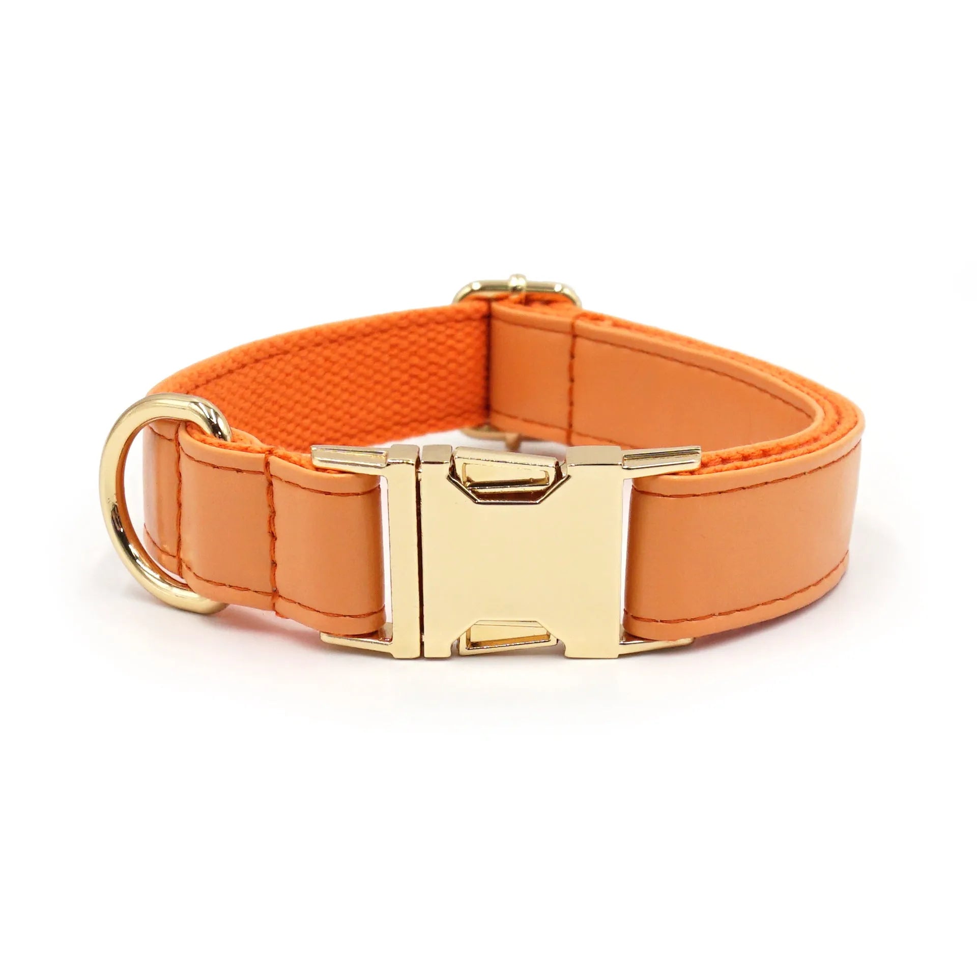Leather Velvet-style dog collar shown in multiple colour options including caramel, dark blue, and dark brown.