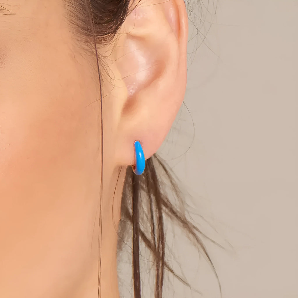 Curved oval epoxy earrings with colourful drip finish in geometric U-shape design