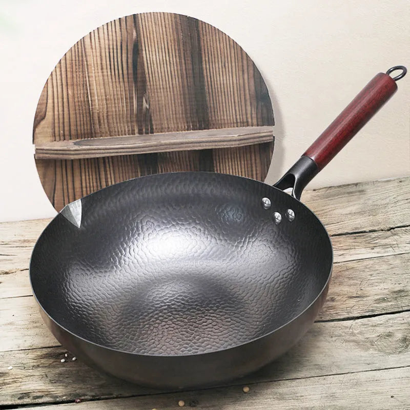 Traditional black iron wok with wooden handle, 40cm diameter, shown with glass lid option