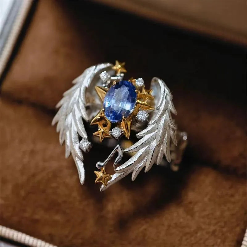 Adjustable geometric angel wings ring with open mouth design in alloy metal