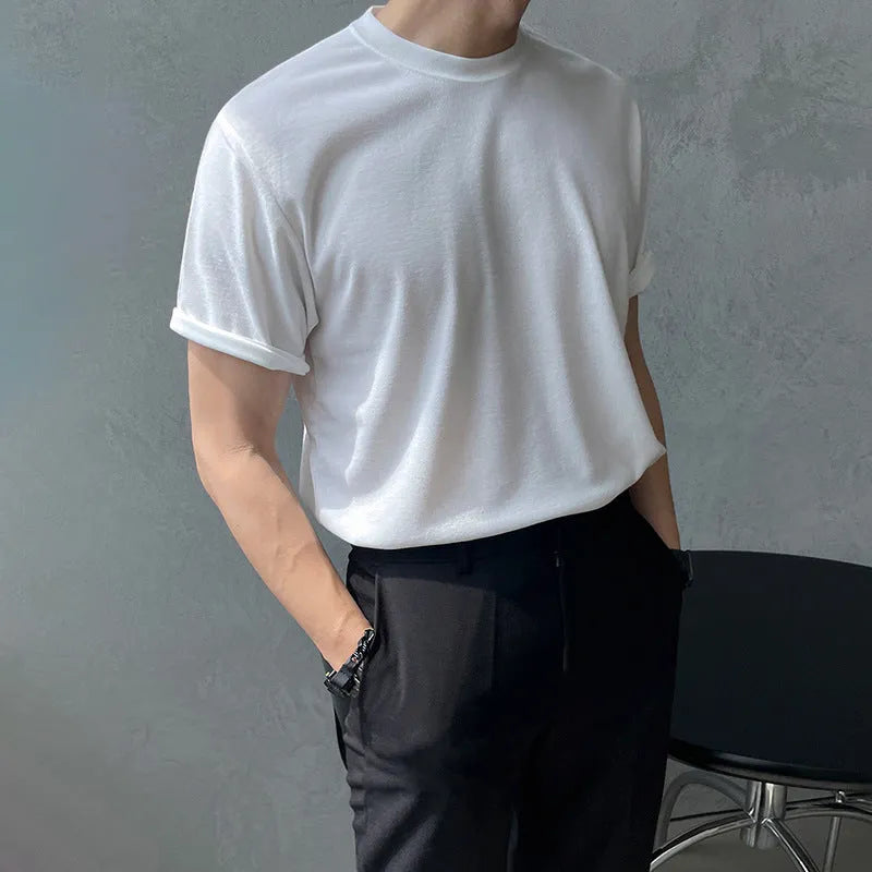 Men's slim fit cotton t-shirt in black on a white background.