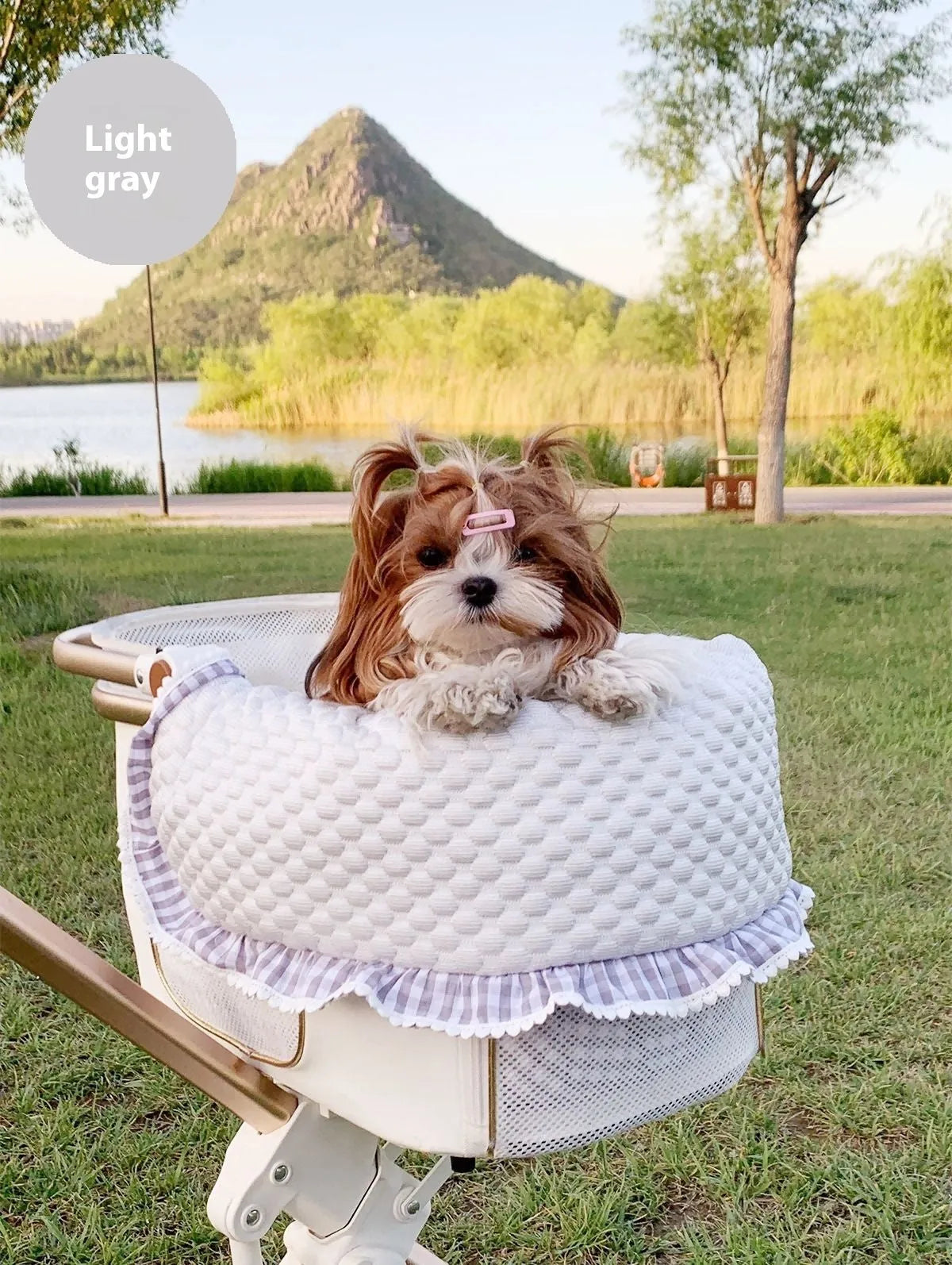 Pet stroller three-piece set showing removable towel, cushion and pillow in floral pattern
