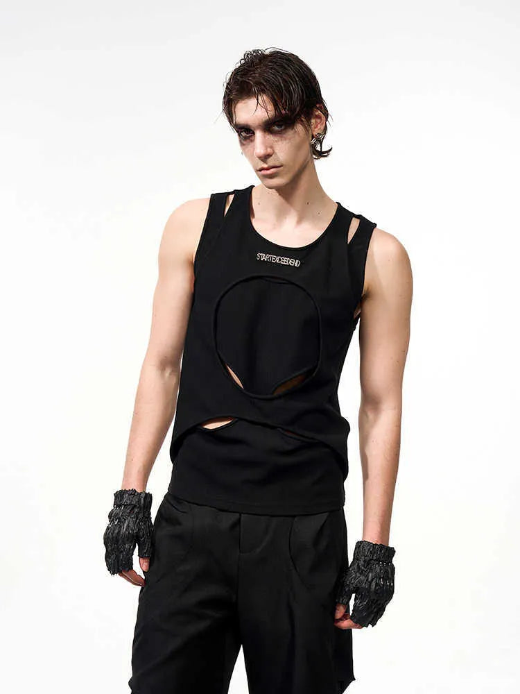 Man's loose fit sleeveless waistcoat in white hollow thread fabric, showing round neck and pullover design.