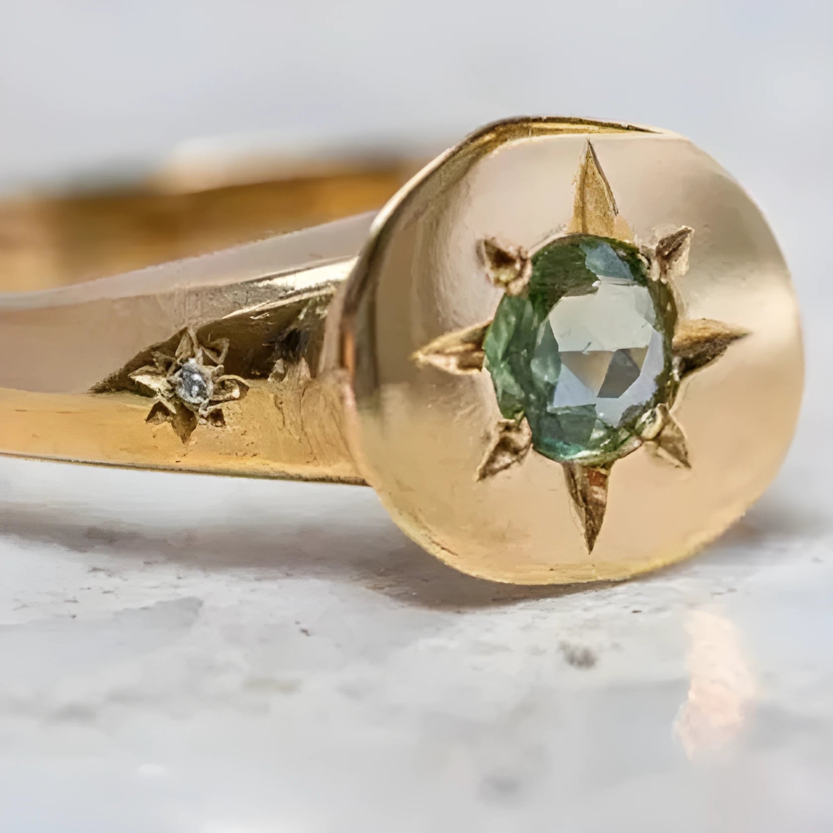 Golden adjustable ring with oval asterism zircon and star design on zinc alloy band