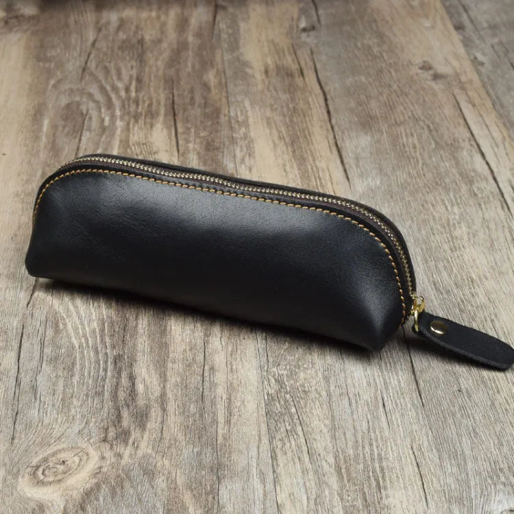 Handmade cowhide leather pencil case in rectangular shape with zipper closure