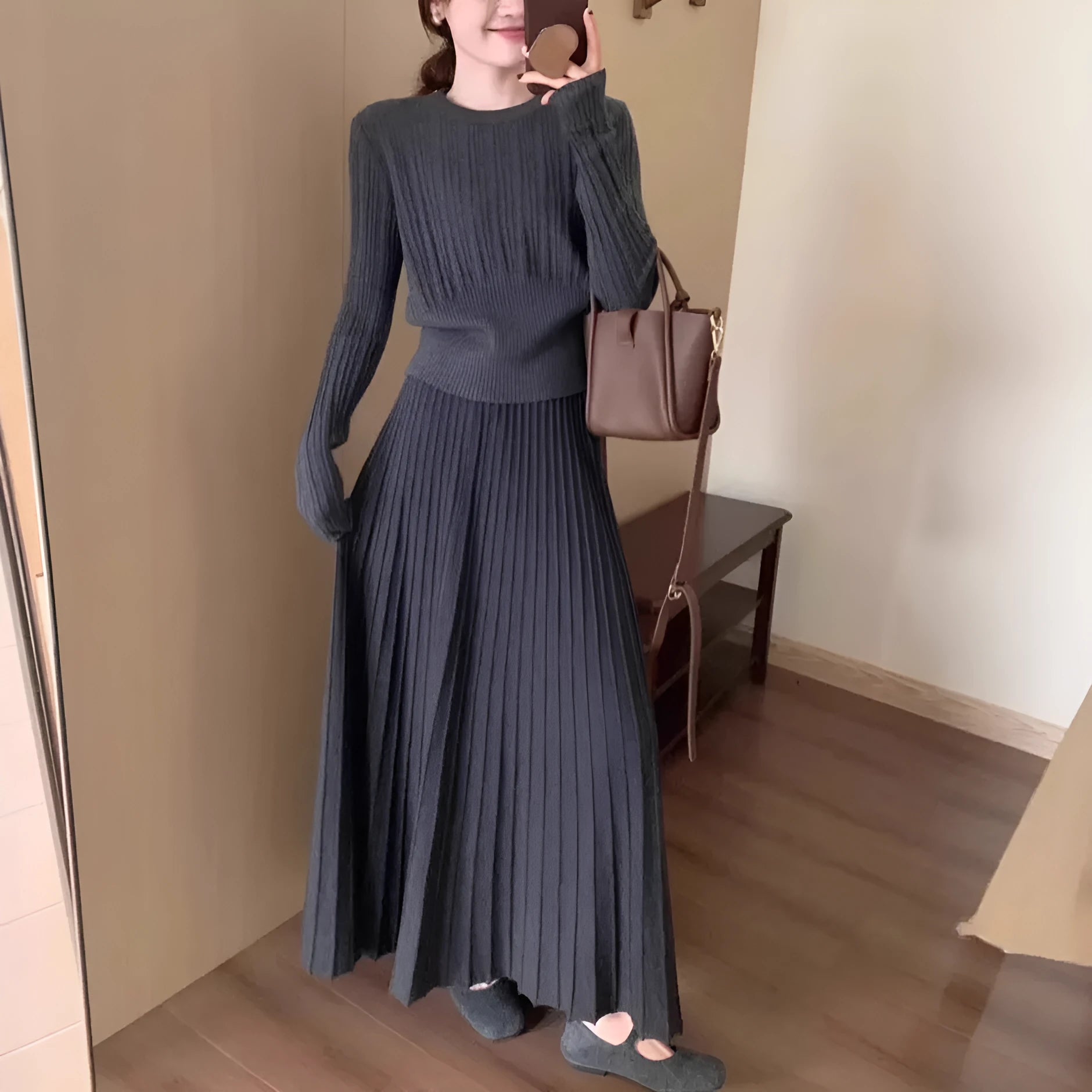 Dark grey artistic retro knitted dress suit set with sweater, skirt, and 3D pattern detail.