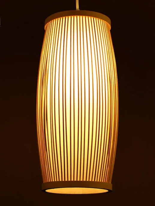Bamboo wall light with woven plait design measuring 15cm diameter