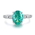 Geometric S925 sterling silver women's ring with emerald and inlaid high carbon diamonds in Palai Bahao style.