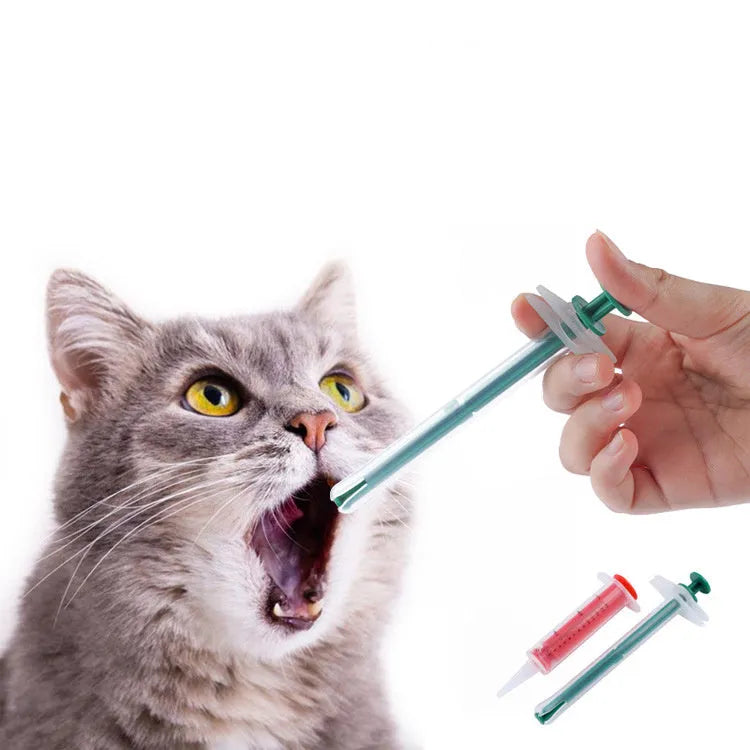 Two silica gel pet pill shooters for cats and dogs, showing soft tip and push rod.