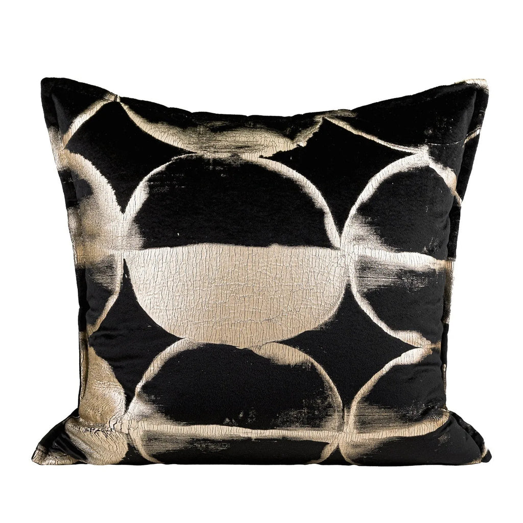 Black gold abstract pattern flannel cushion pillow in square and rectangular sizes on a sofa.