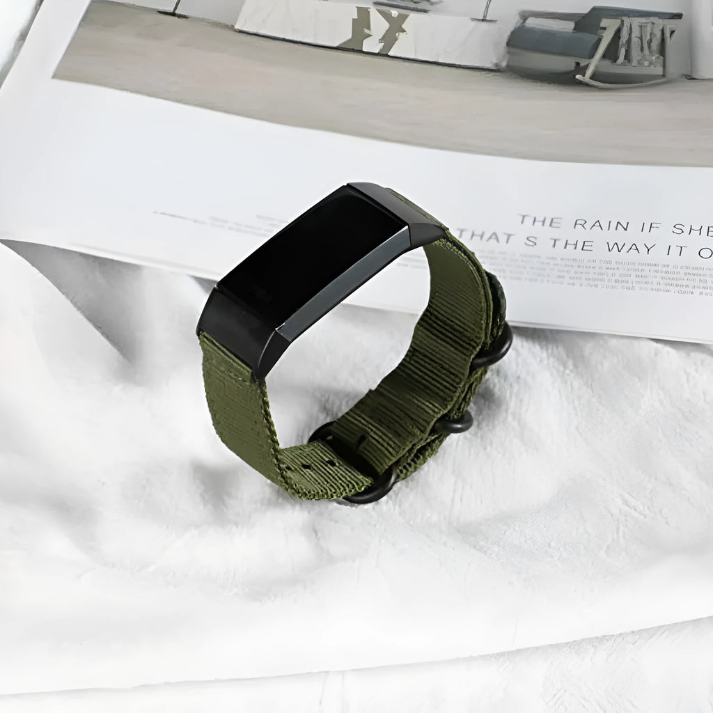 Nylon replacement watch strap with three-ring buckle for Fitbit Charge 2, 3, 4, and 5 fitness trackers.