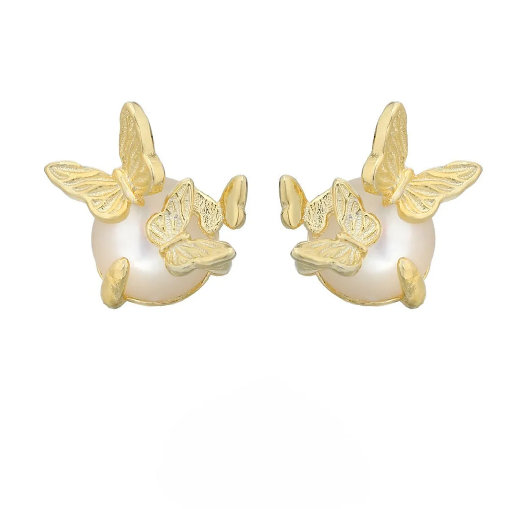 A pair of 925 silver butterfly ear studs with an original animal design, shown in gold and white gold colour finishes.