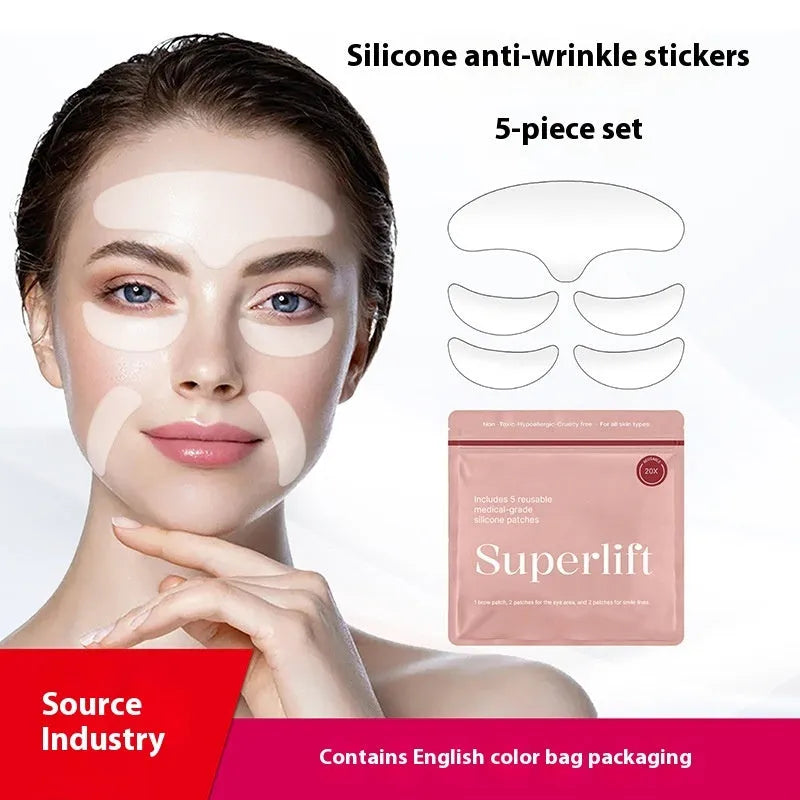 Five silicone anti-wrinkle face stickers arranged on white background