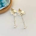 Women's shell acrylic pearl tassel earrings showing 8.8cm length with four clip style options