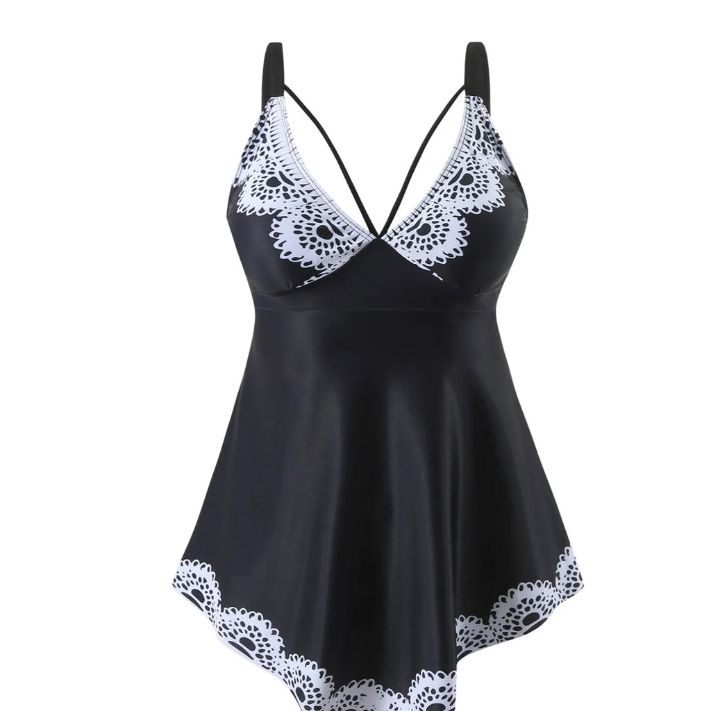 Plus size women's two-piece bikini swimsuit in dark blue, showing backless design.