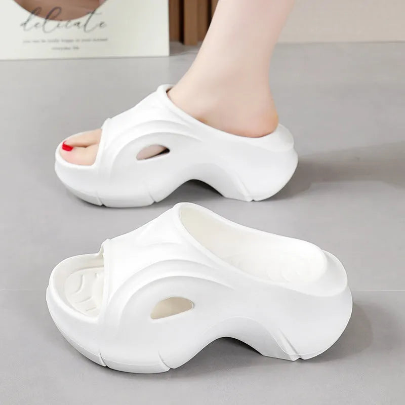 Women's thick-soled EVA slippers in white, black and rose red colours for outdoor beach wear