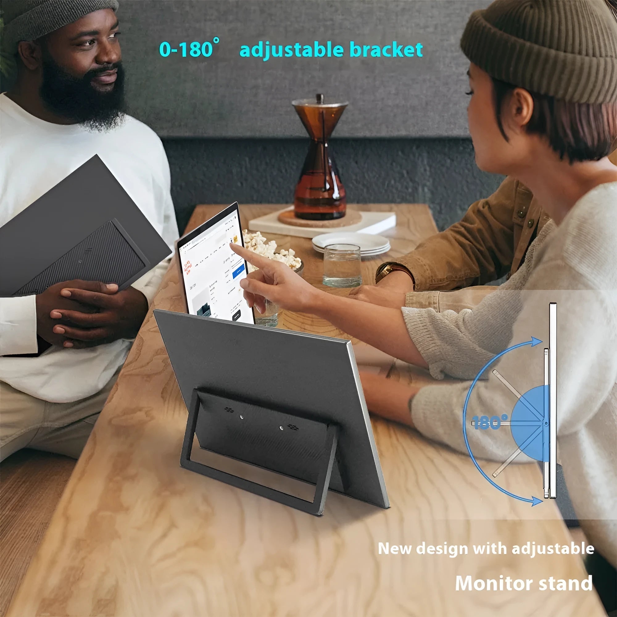 Black 15.6-inch portable monitor with adjustable stand on office desk