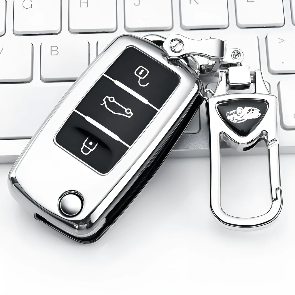 Blue TPU key case for VW Model A folding car keys on a keyring.