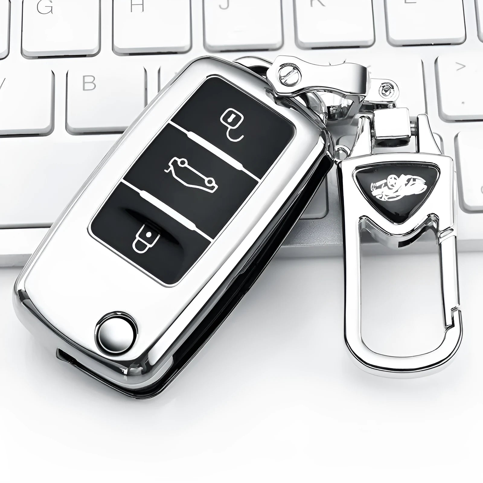 Blue TPU key case for VW Model A folding car keys on a keyring.