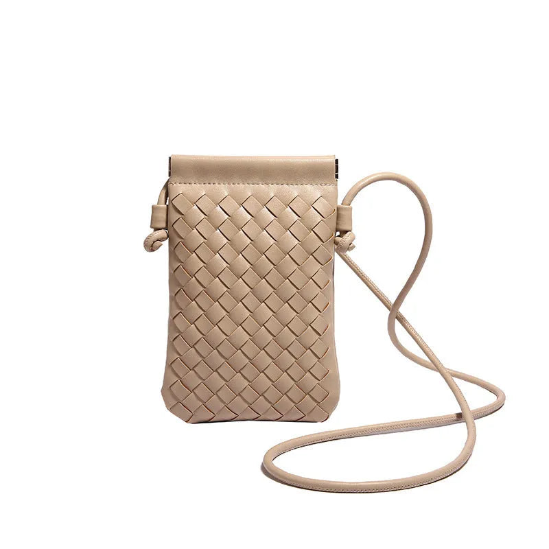 Vintage weave crossbody bag in retro style showing square vertical shape and woven texture