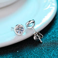 925 sterling silver Pt950 gold plated women's earrings with geometric design and moissanite or zircon stone.