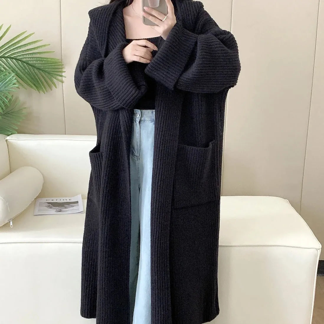 Loose hooded acrylic cardigan coat for women in beige colour with 80cm length and raglan sleeves