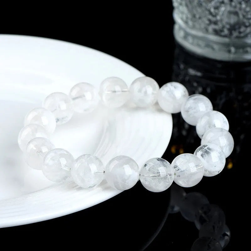 Women's crystal bracelet with natural blizzard snowflake round beads in geometric design with traditional elements