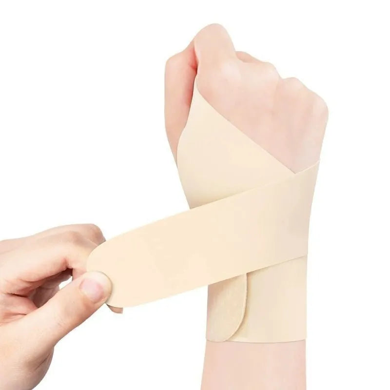 Adjustable breathable athletic wristguard for sports support in black and skin colour options.