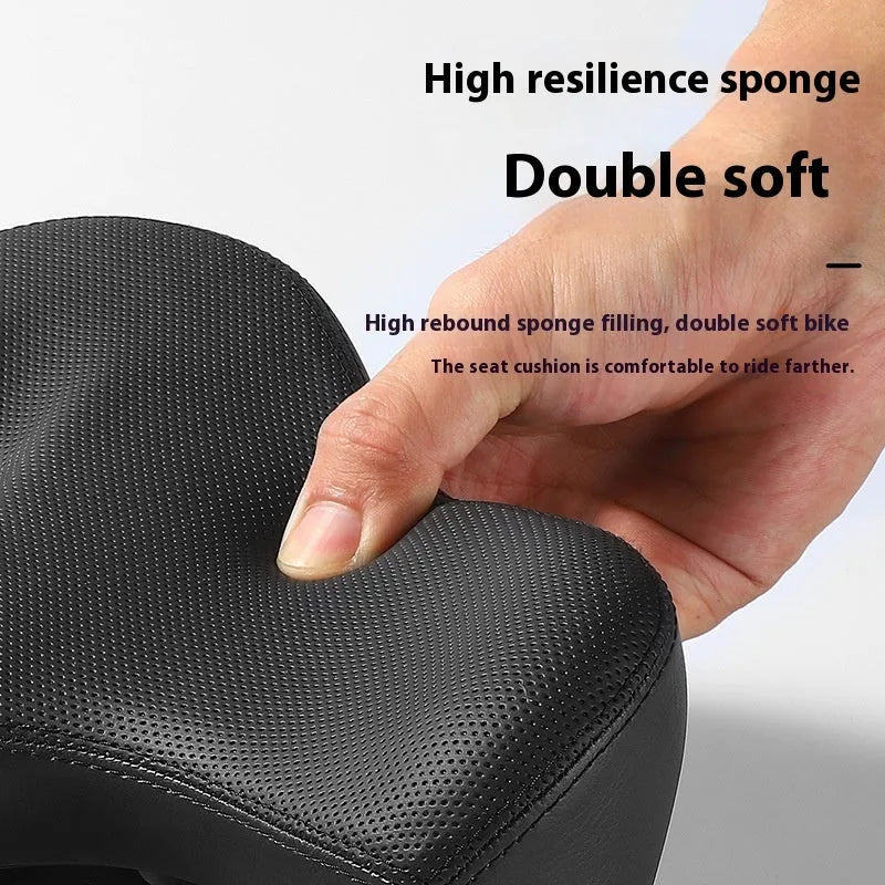 Black bicycle seat cushion with leather exterior and foam padding