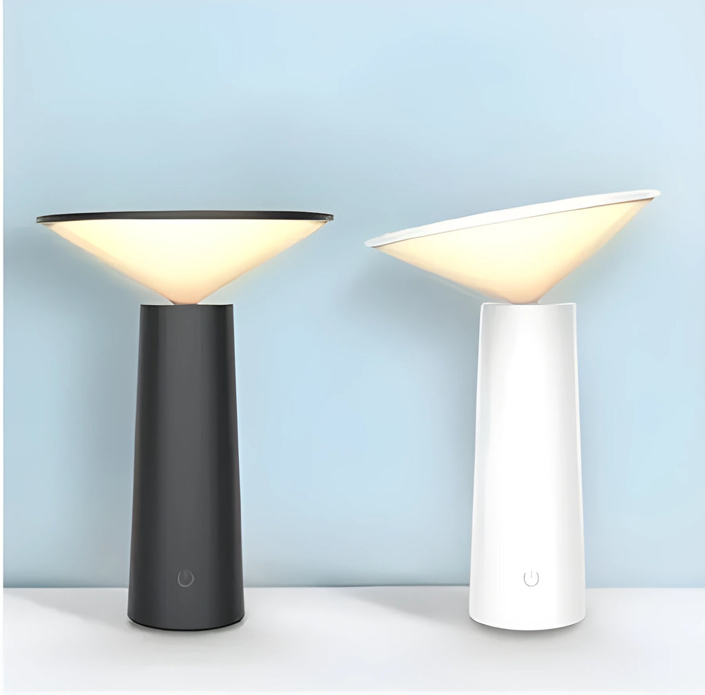 Black USB rechargeable LED desk lamp with touch sensor on a wooden desk, showing its adjustable lamp head.