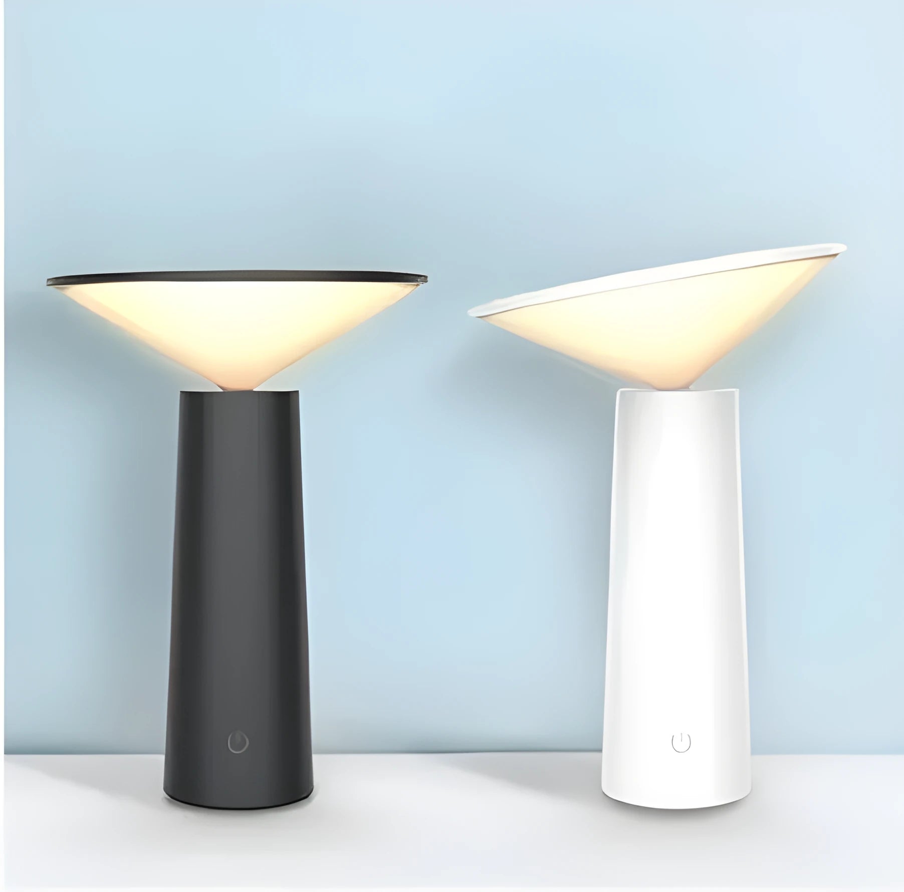 Black USB rechargeable LED desk lamp with touch sensor on a wooden desk, showing its adjustable lamp head.