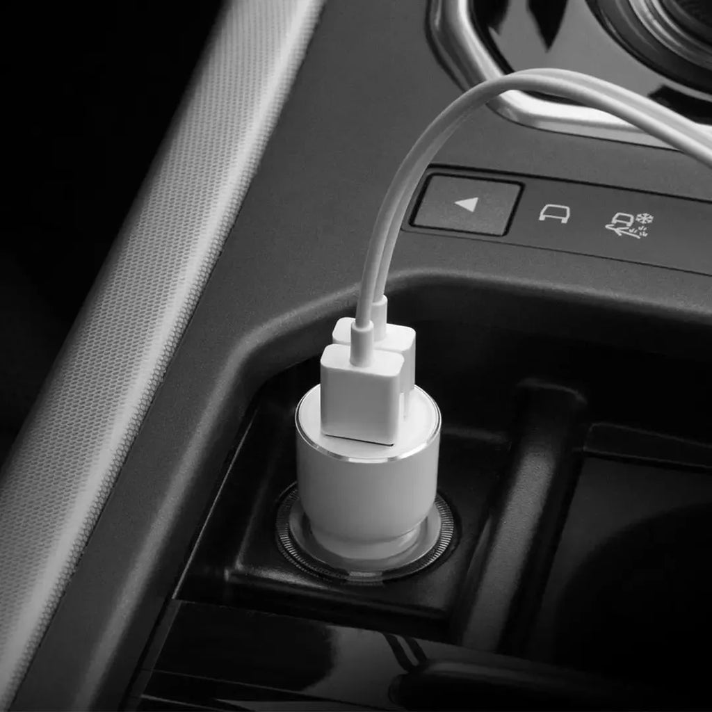 Black music Bluetooth car charger with USB port for mobile device charging in vehicles