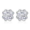 Pair of heart-shaped silver earrings with a four-leaf clover design and zircon stones.