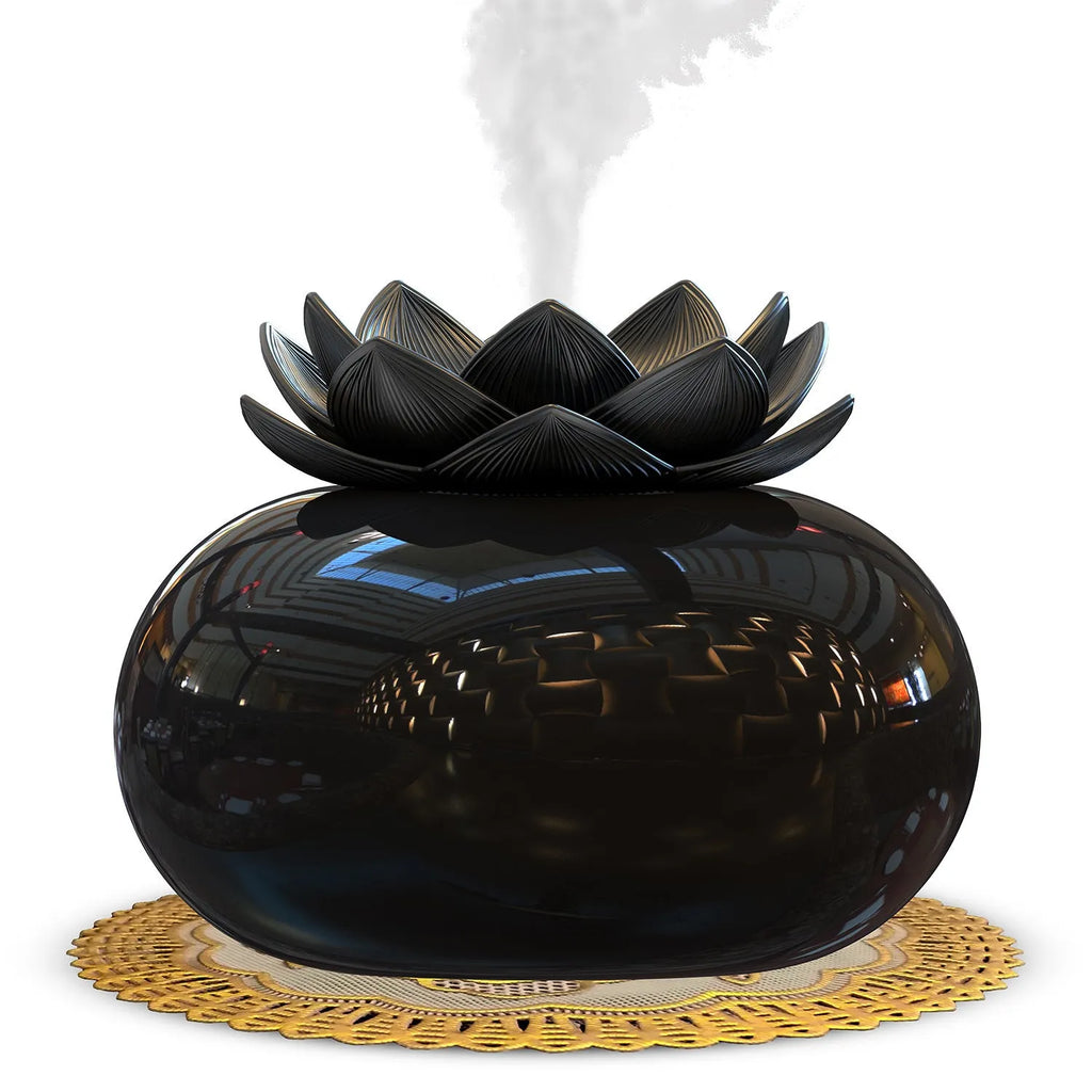 Pure black Lotus ultrasonic aromatherapy humidifier with USB cable and round design.