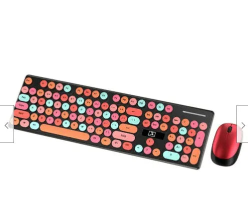 Vibrant yellow wireless punk manipulator design keyboard and mouse set on a desk.