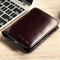 Men's compact leather wallet open showing card slots, change pouch, photo slot, and dark privacy compartment.