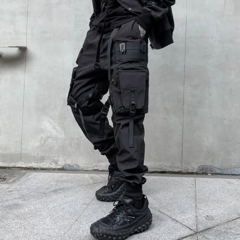 Men's black casual overalls loose fit binding hem trousers front view on mannequin