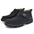 Black handmade stitching flat bottom slip on lazy shoes with low heel on a plain background