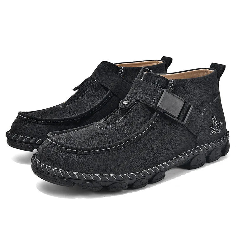 Black handmade stitching flat bottom slip on lazy shoes with low heel on a plain background