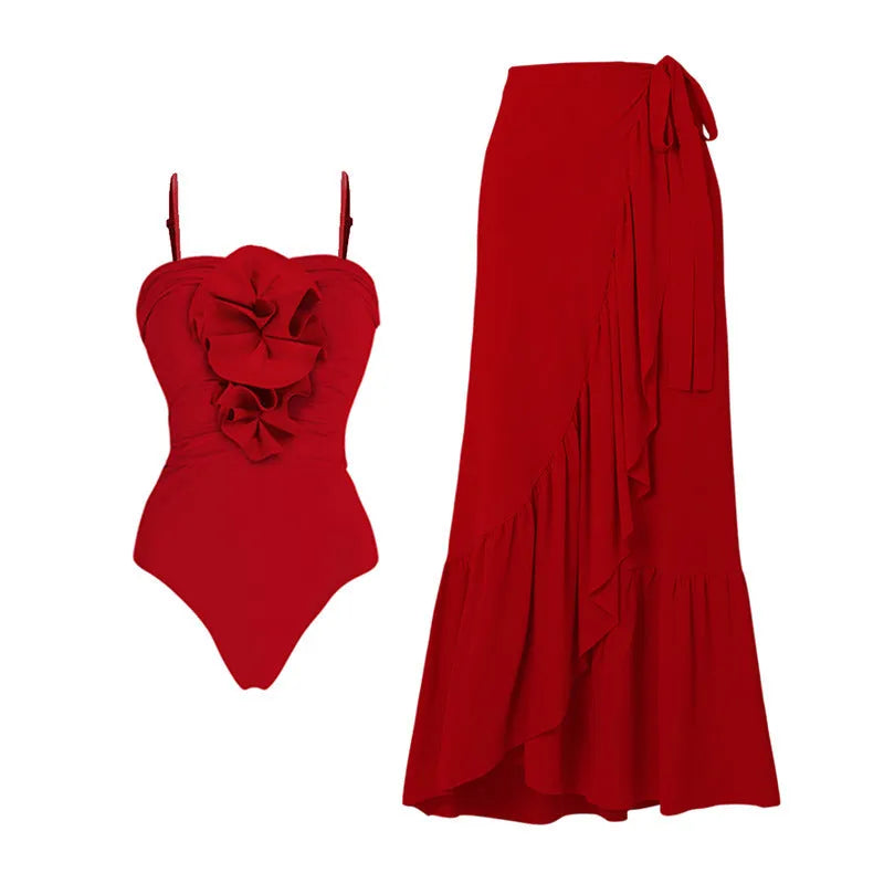 Red women's V-neck swimsuit with detachable floral skirt and open back halter design