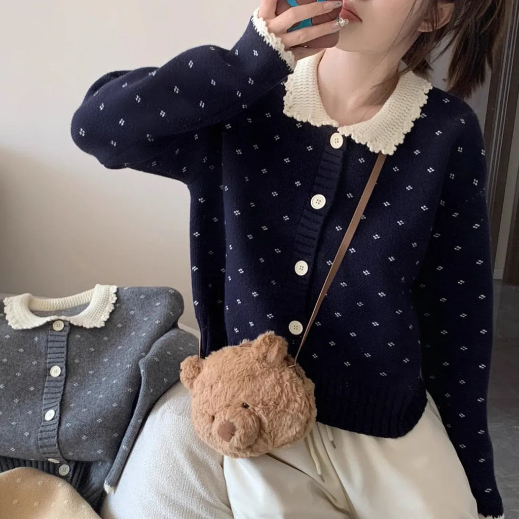 Women's floral knit cardigan coat with Peter Pan collar and button front in navy blue