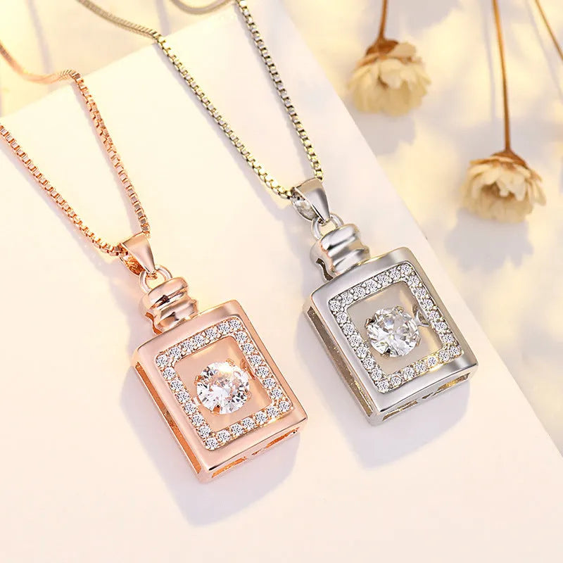 Sterling silver love heart necklace with crown and bow detailing pendant
